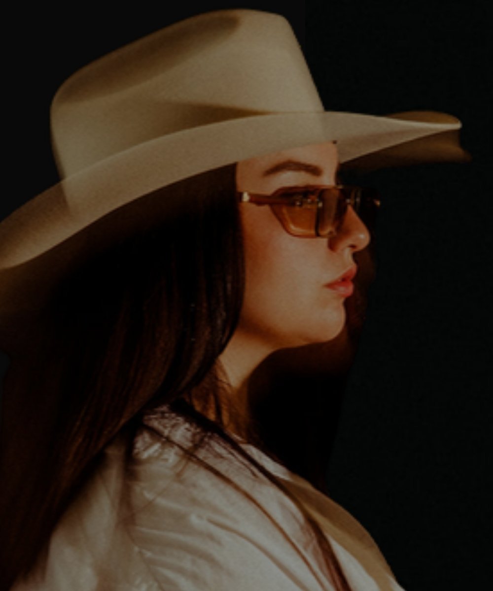 Portrait of Maria Wik in a cowboy hat