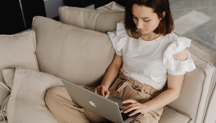Woman building a Kajabi Website