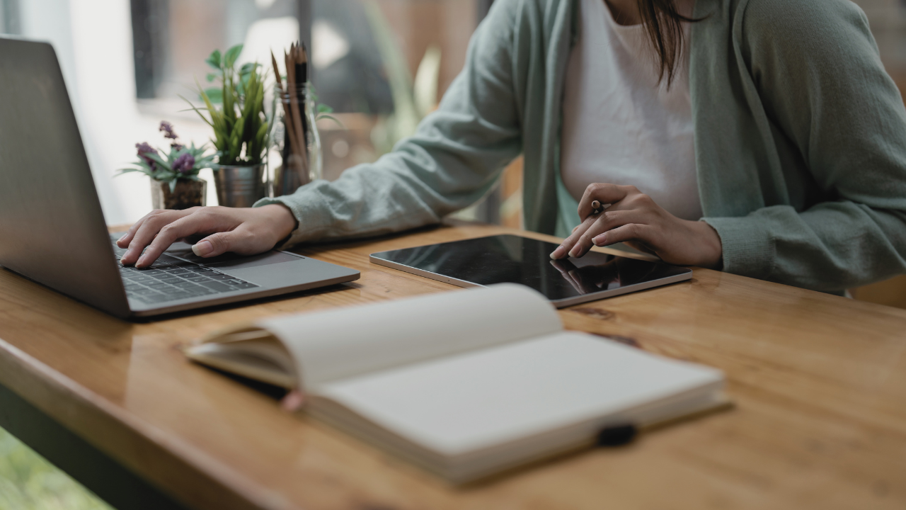 Woman building a Kajabi Website