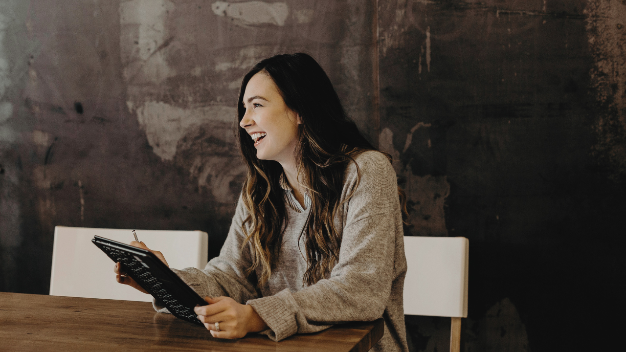 Woman building a Kajabi Website