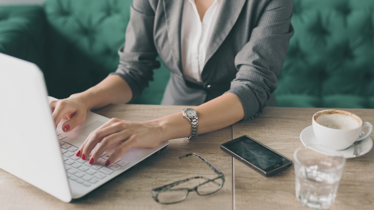 Woman building a Kajabi Website