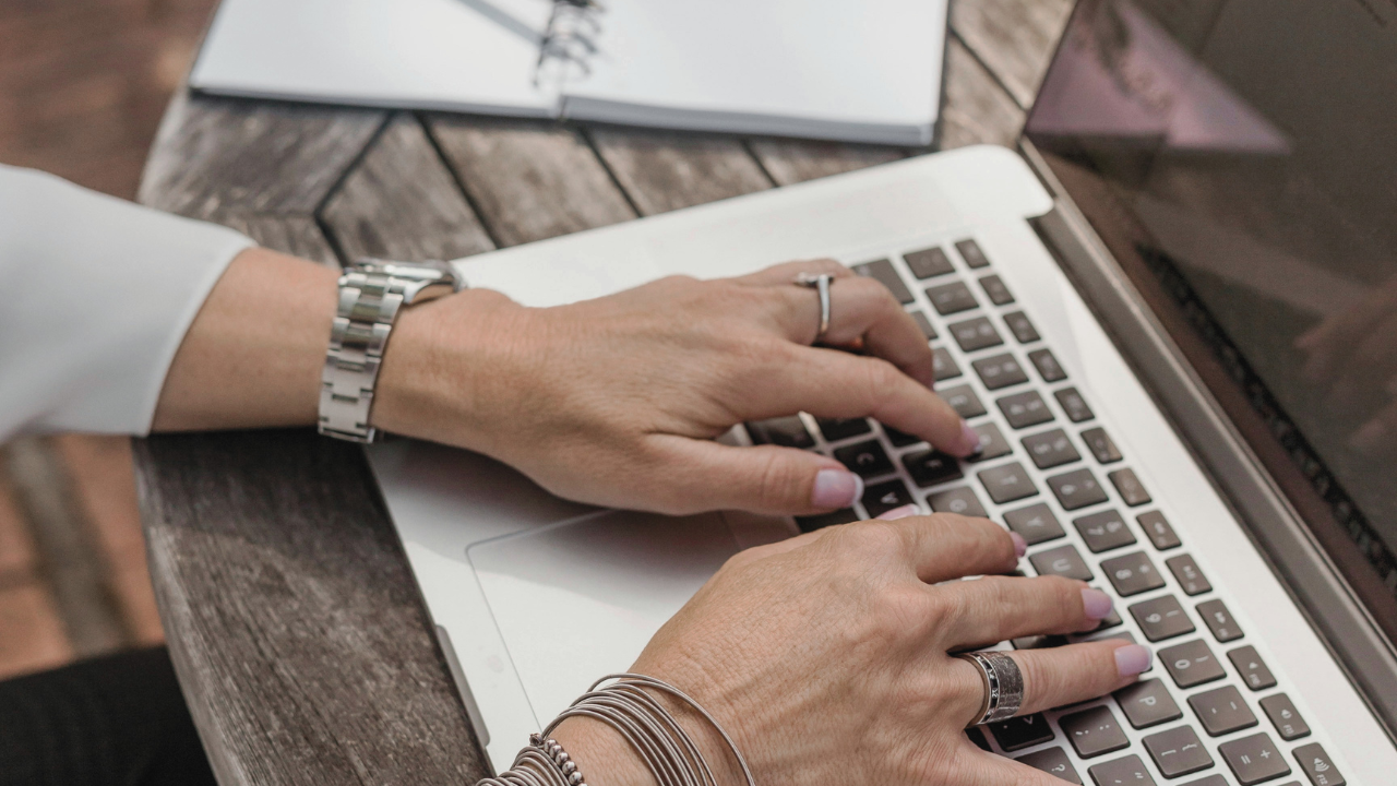 Woman building a Kajabi Website