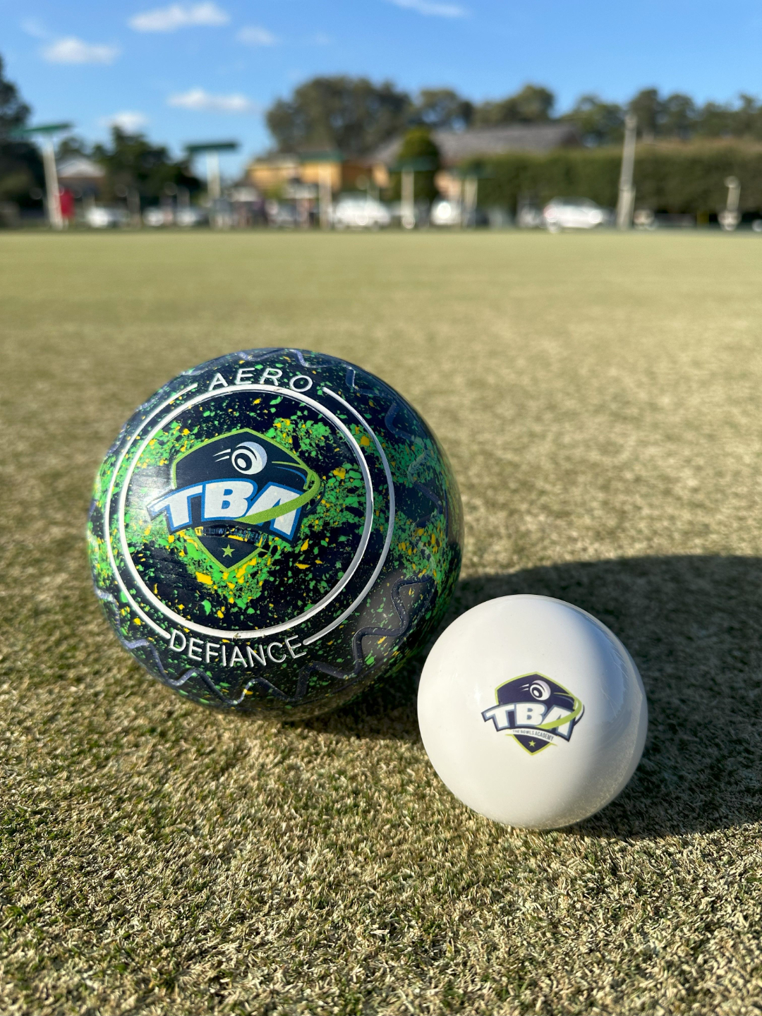 sunset with aero lawn bowls and jack