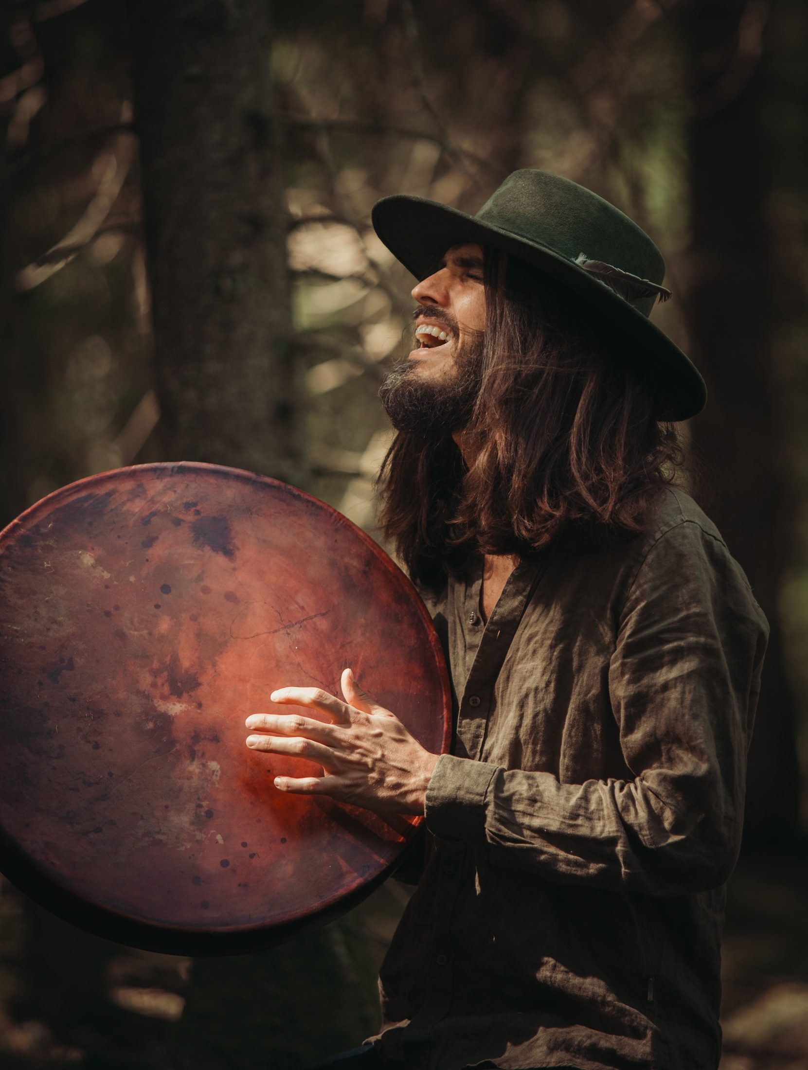 Joseph singing with frame drum