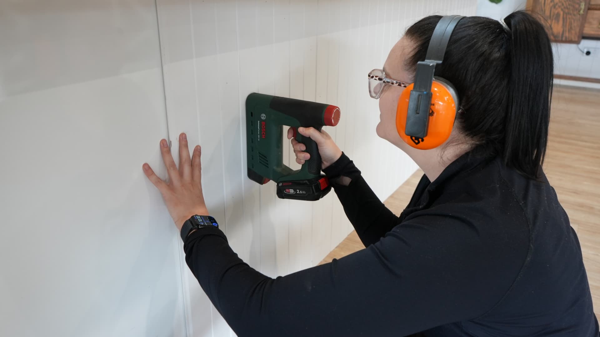 Jade using a nail gun