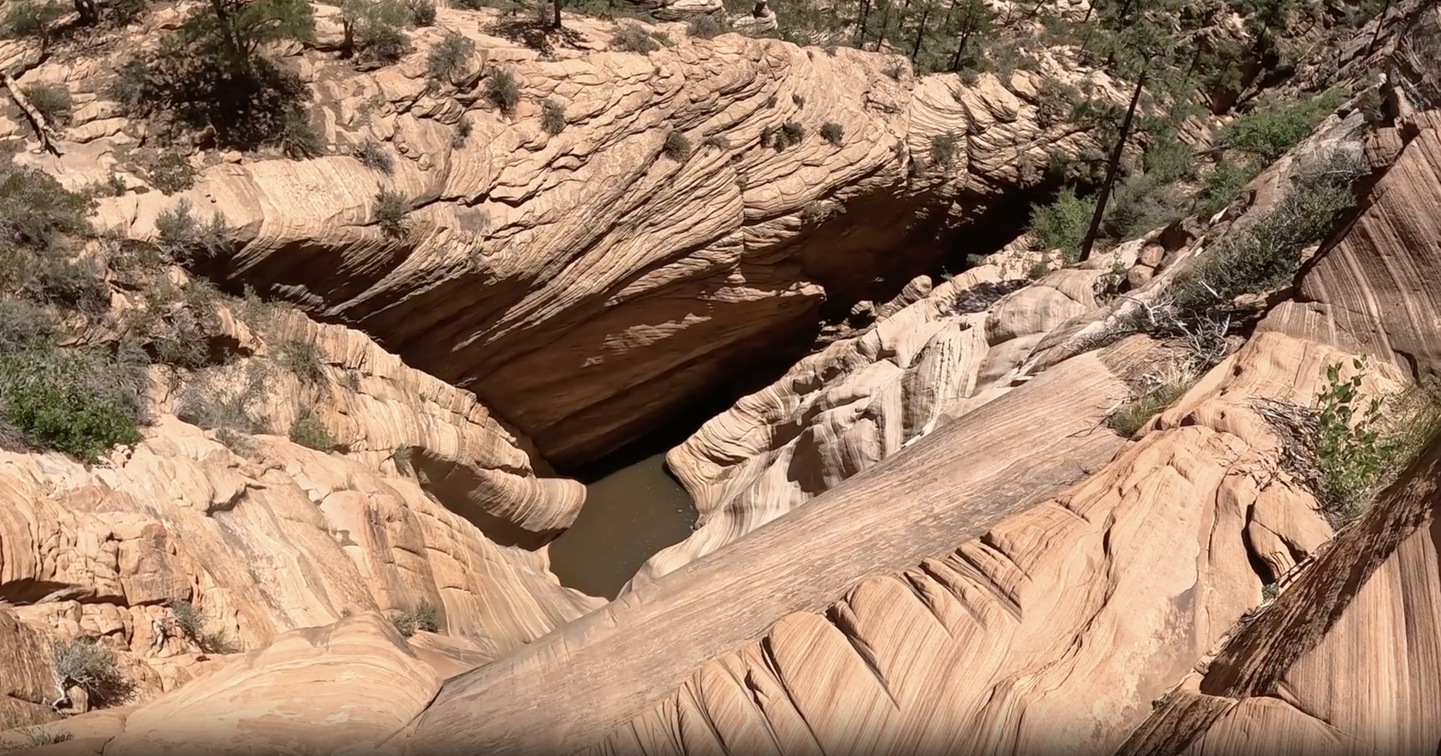 Overlooking a 165-foot cliff in Southern Utah