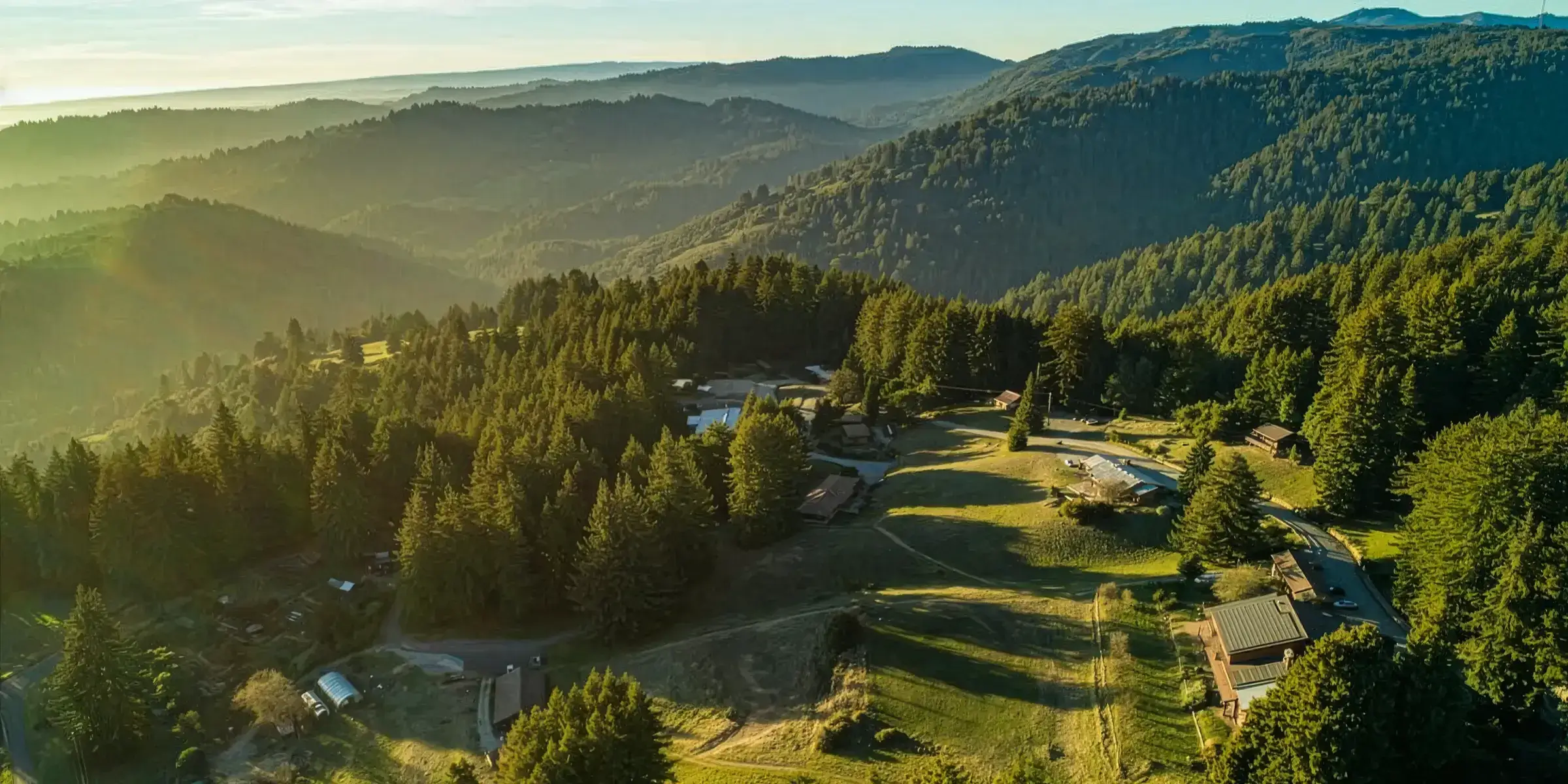 Aerial view of the redwood hills and retreat grounds at Mount Madonna Center