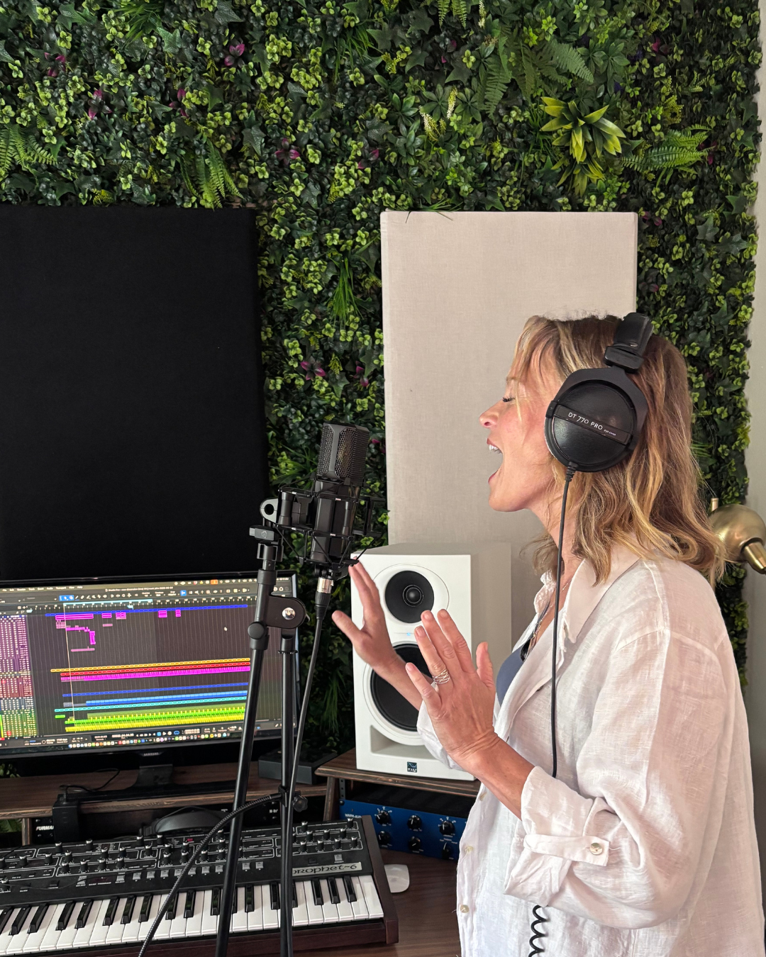 JJ singing in a recording studio