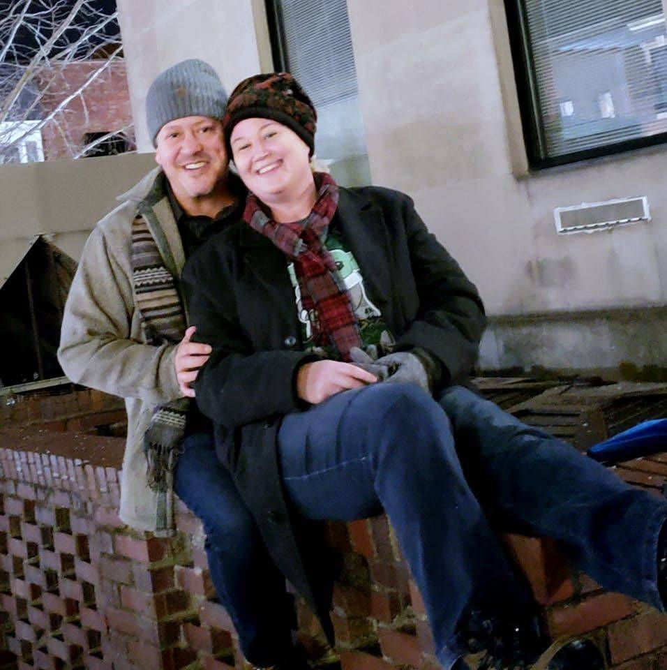 Brent and Amethyst with winter coats and hats at the Christmas tree lighting in Gallatin.