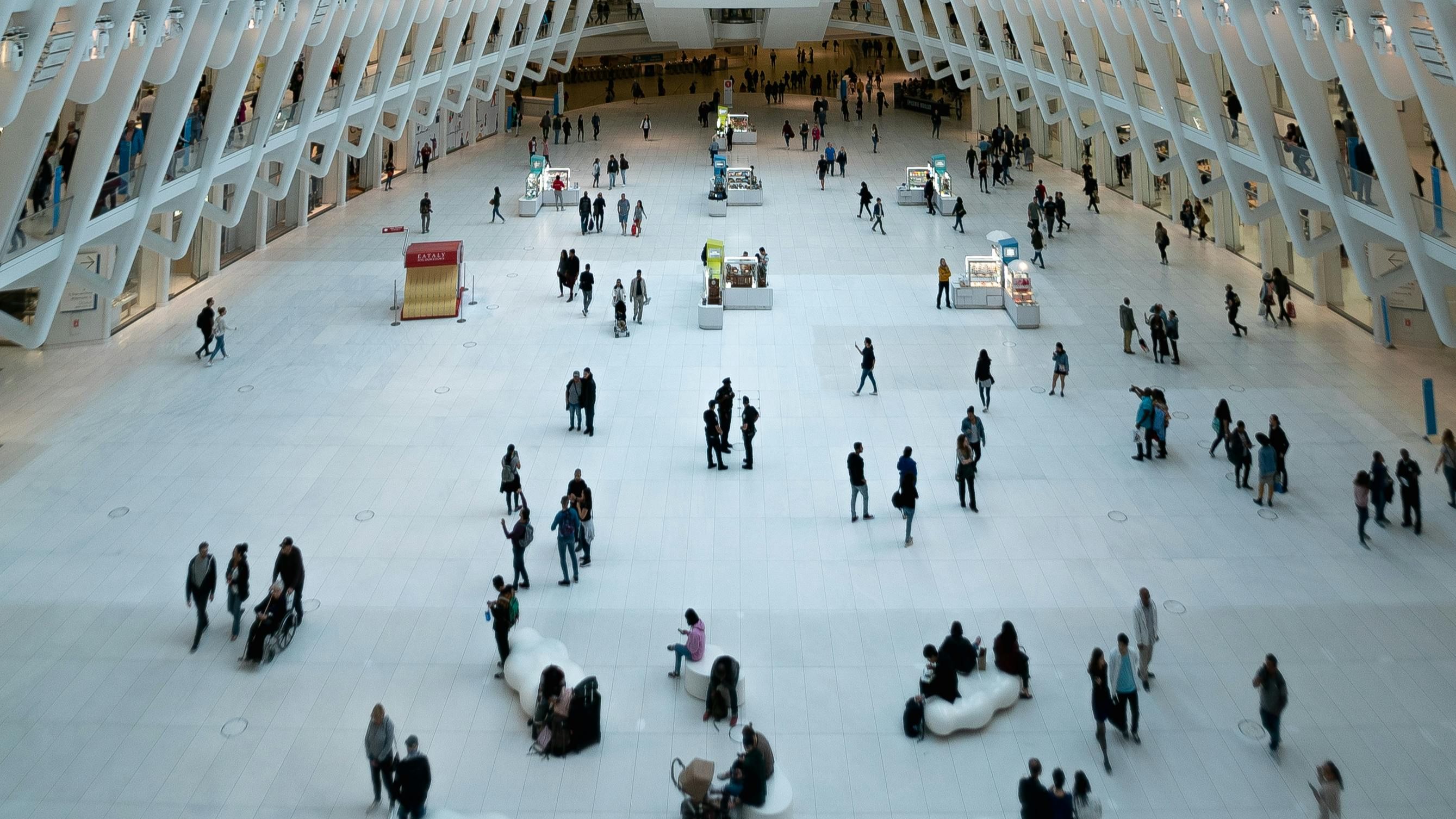 Diffuse group of people in an exhibit hall