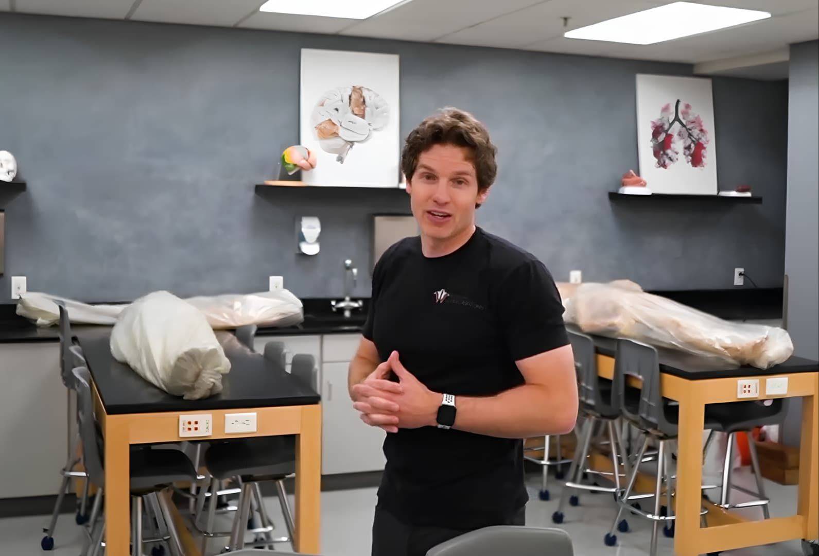 Jonathan Bennion demonstrating anatomical structures on a human cadaver in the Institute of Human Anatomy lab.