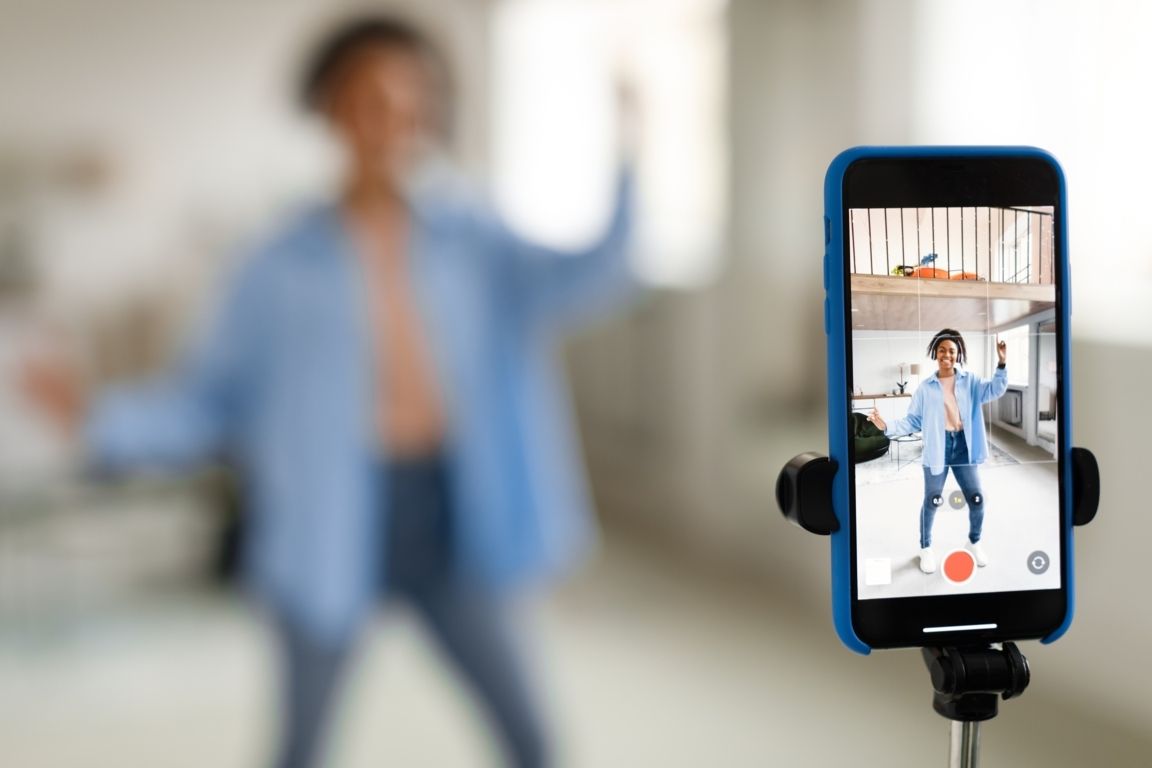 Girl dancing and filming herself