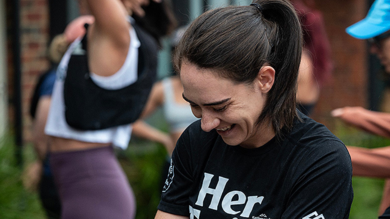 Women trail runners discussing community and belonging without race goals