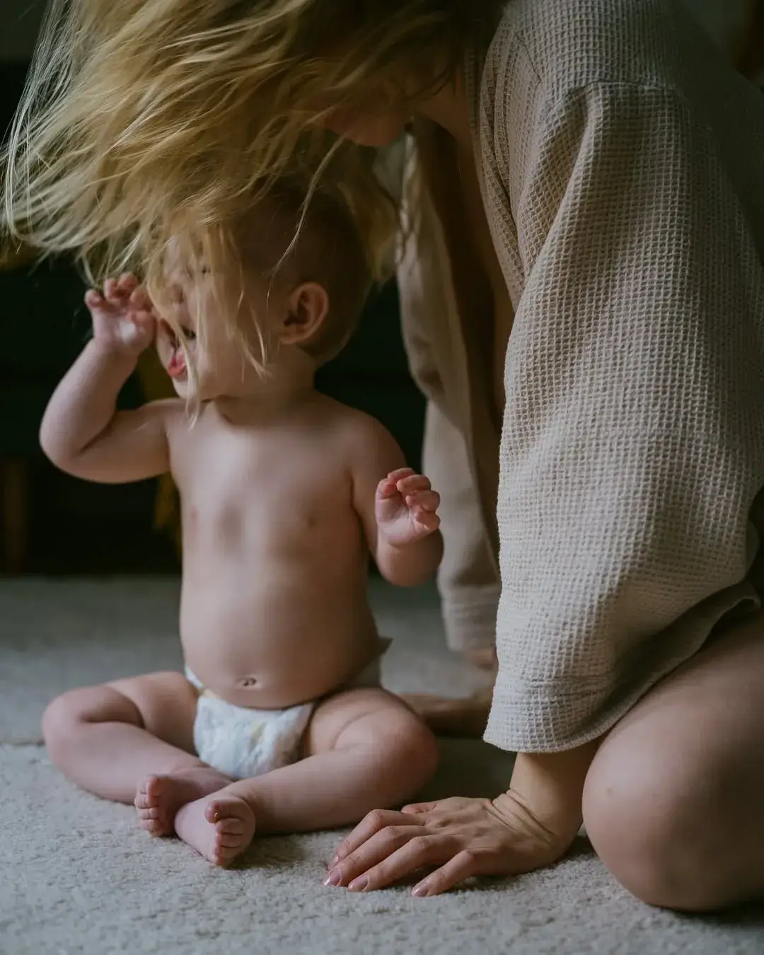 Mamá jugando con su bebé
