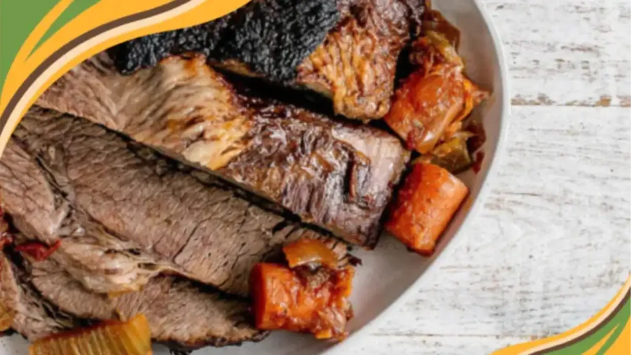 Deliciously tender pot roast with carrots and celery served on a white plate, perfect for a cozy dinner.