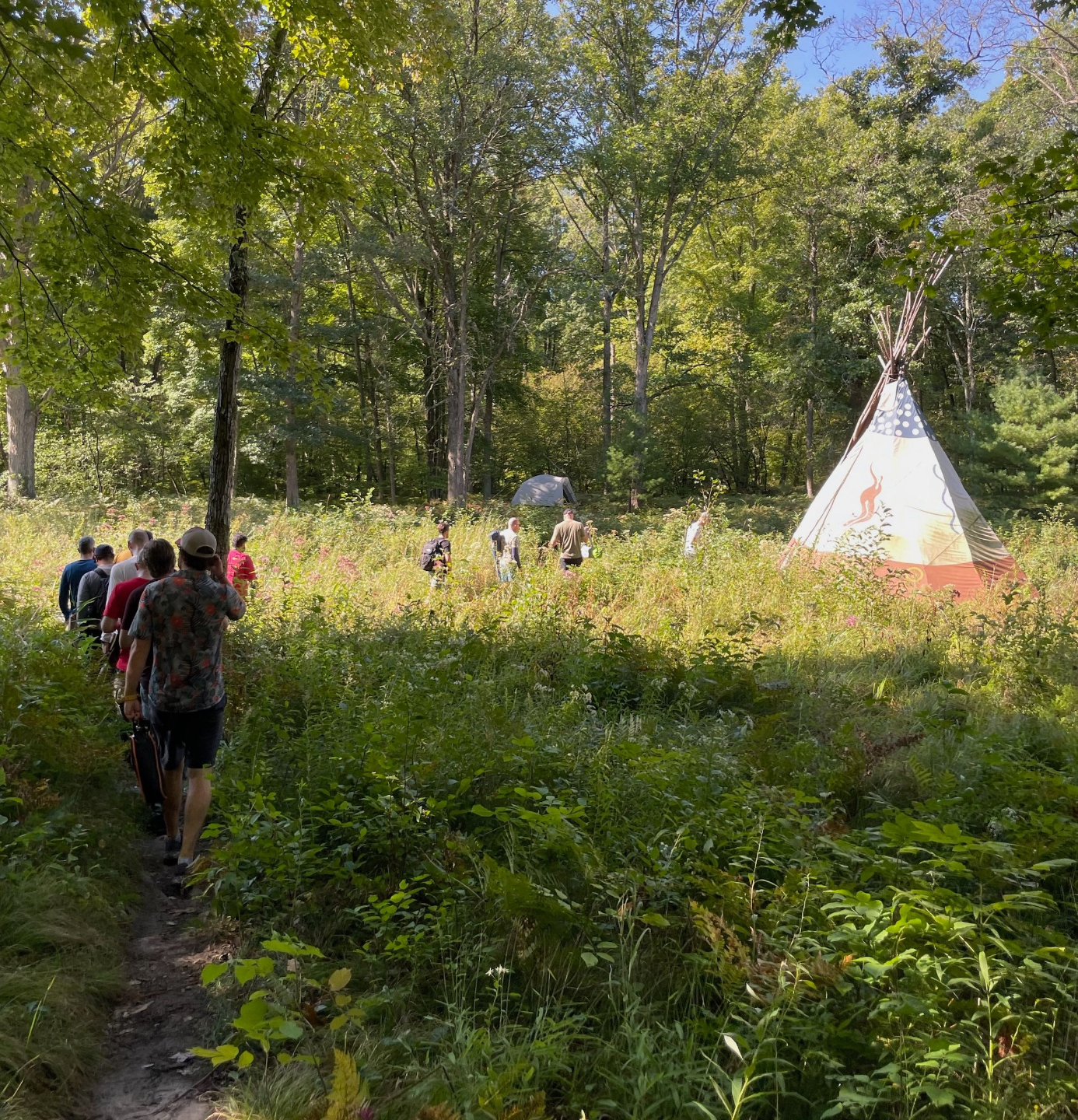 Men head out to the teepee at annual men's retreat with metro-detroit-mens-therapy