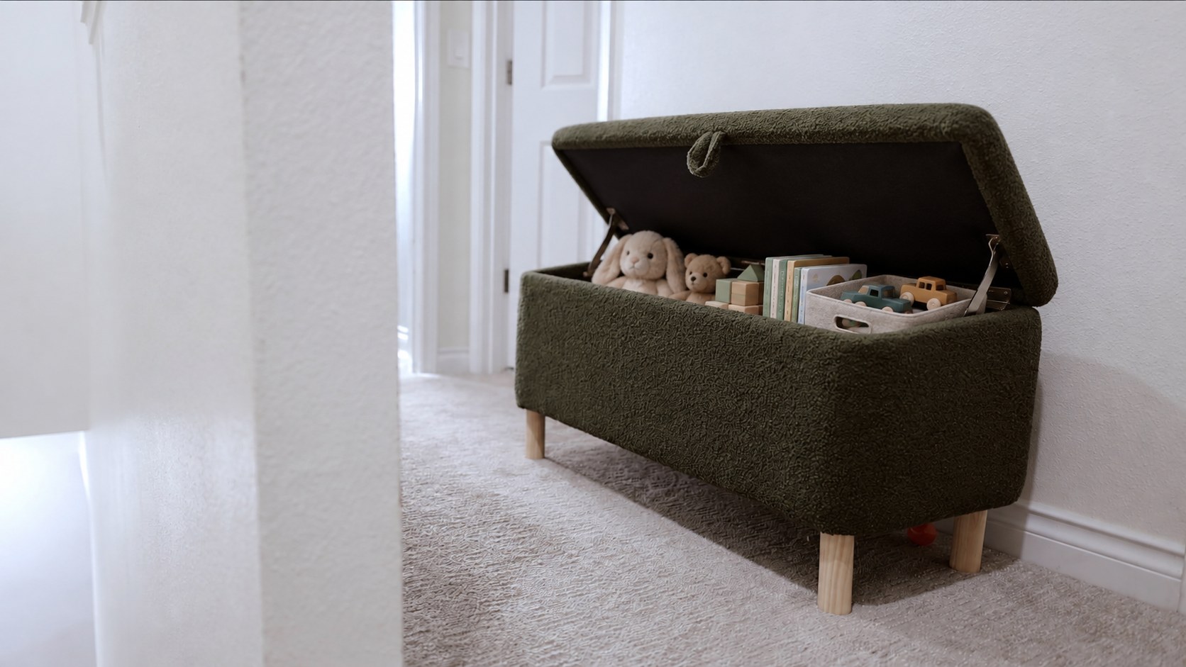 A toddler's single toy box used as a limit for toys