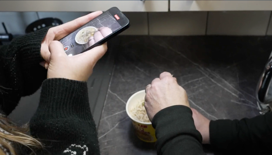 Businesses learning how to film professional video on their smartphones during a Business Film School workshop in Hertfordshire.
