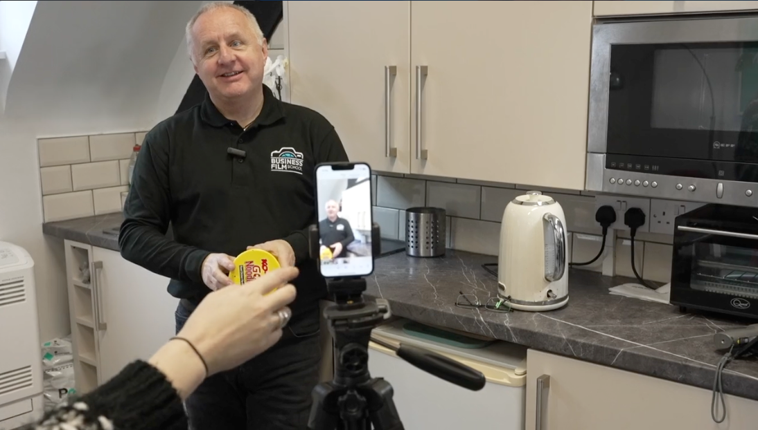 Businesses learning how to film professional video on their smartphones during a Business Film School workshop in Hertfordshire.