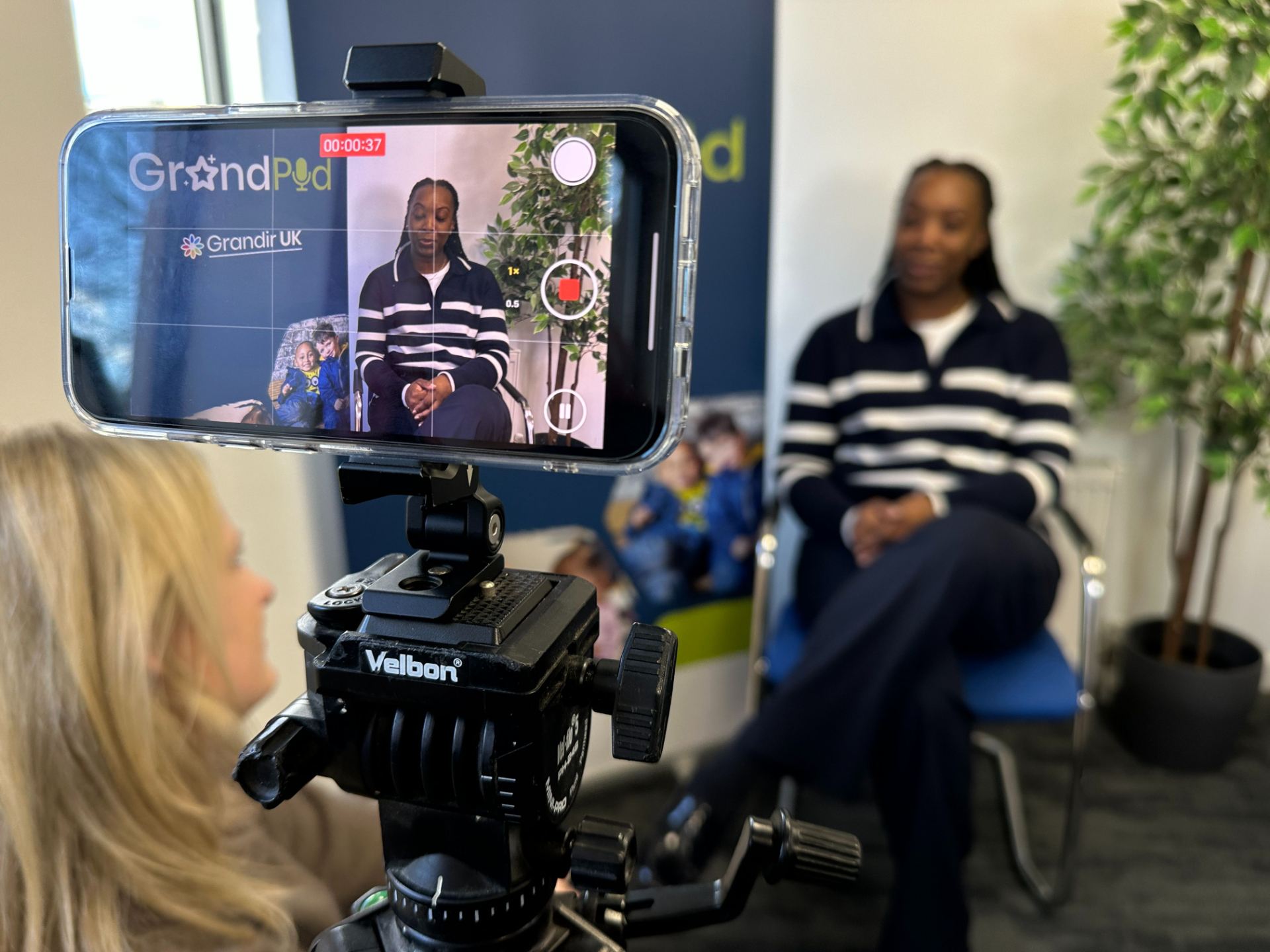 Smartphone video training workshop filming an interview as part of a training course.