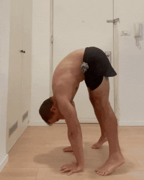 Member doing press handstand