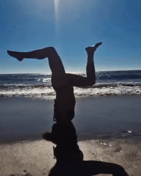 Member doing headstand