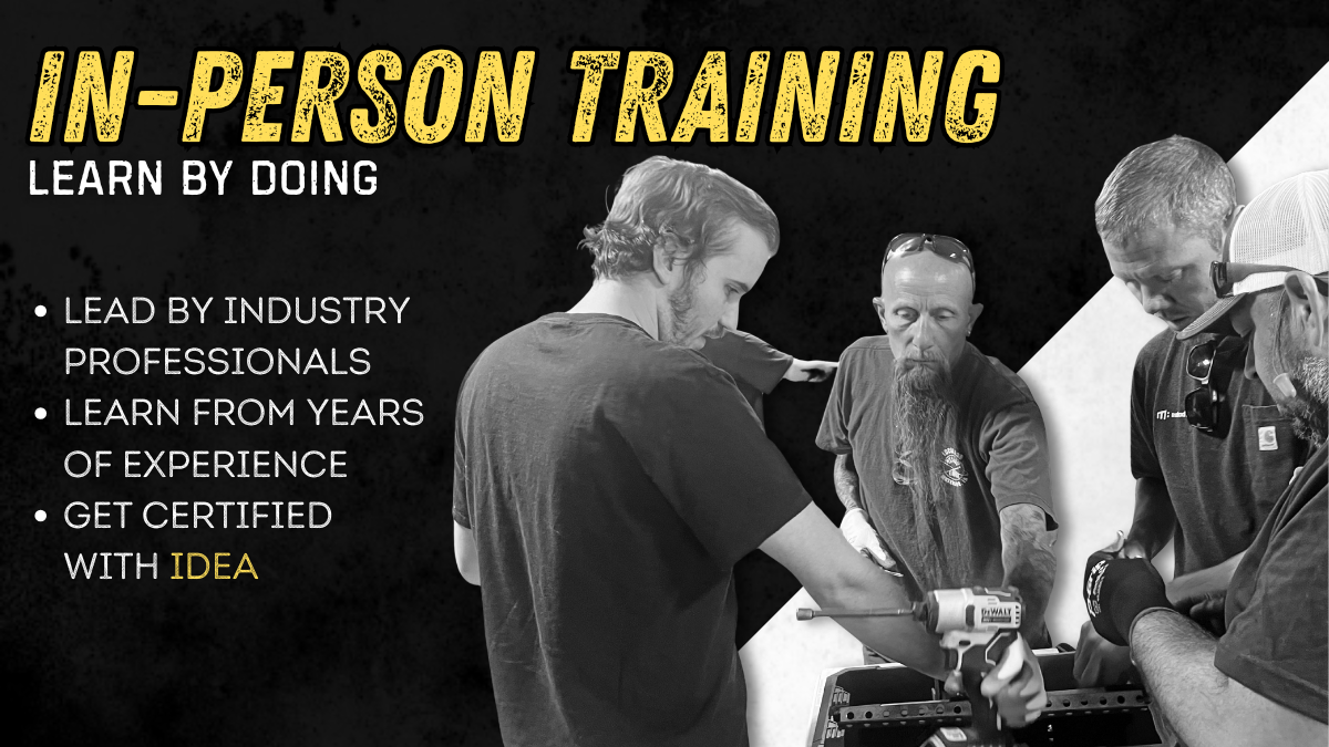 In Person Training: Group of professionals working on garage door components