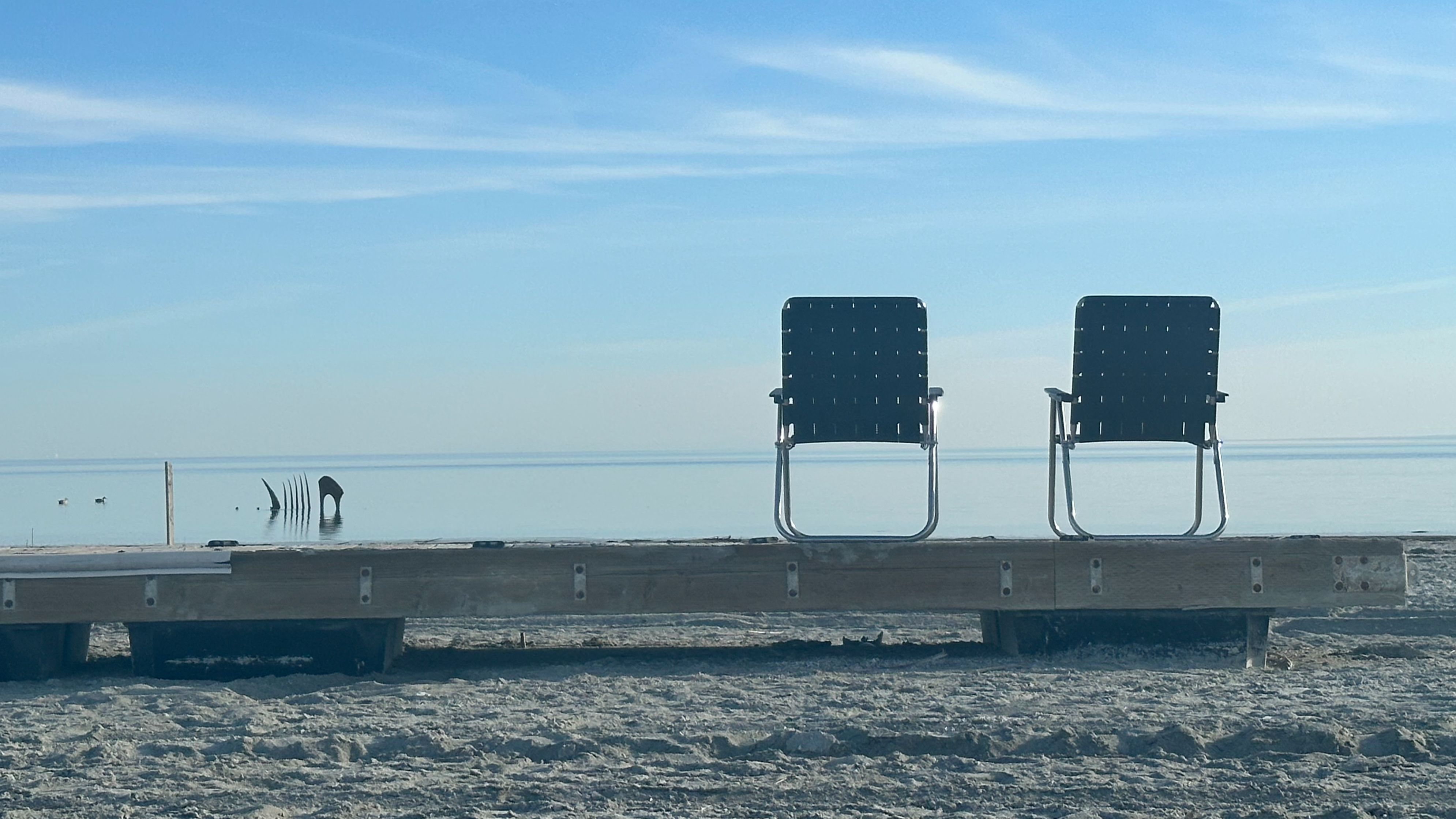 Big Neighborhood chairs looking out on the Salton Sea