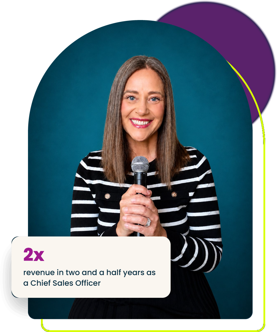 Kara Bunde-Dunn holding a microphone - doubled revenue in two and a half years as a Chief Sales Officer