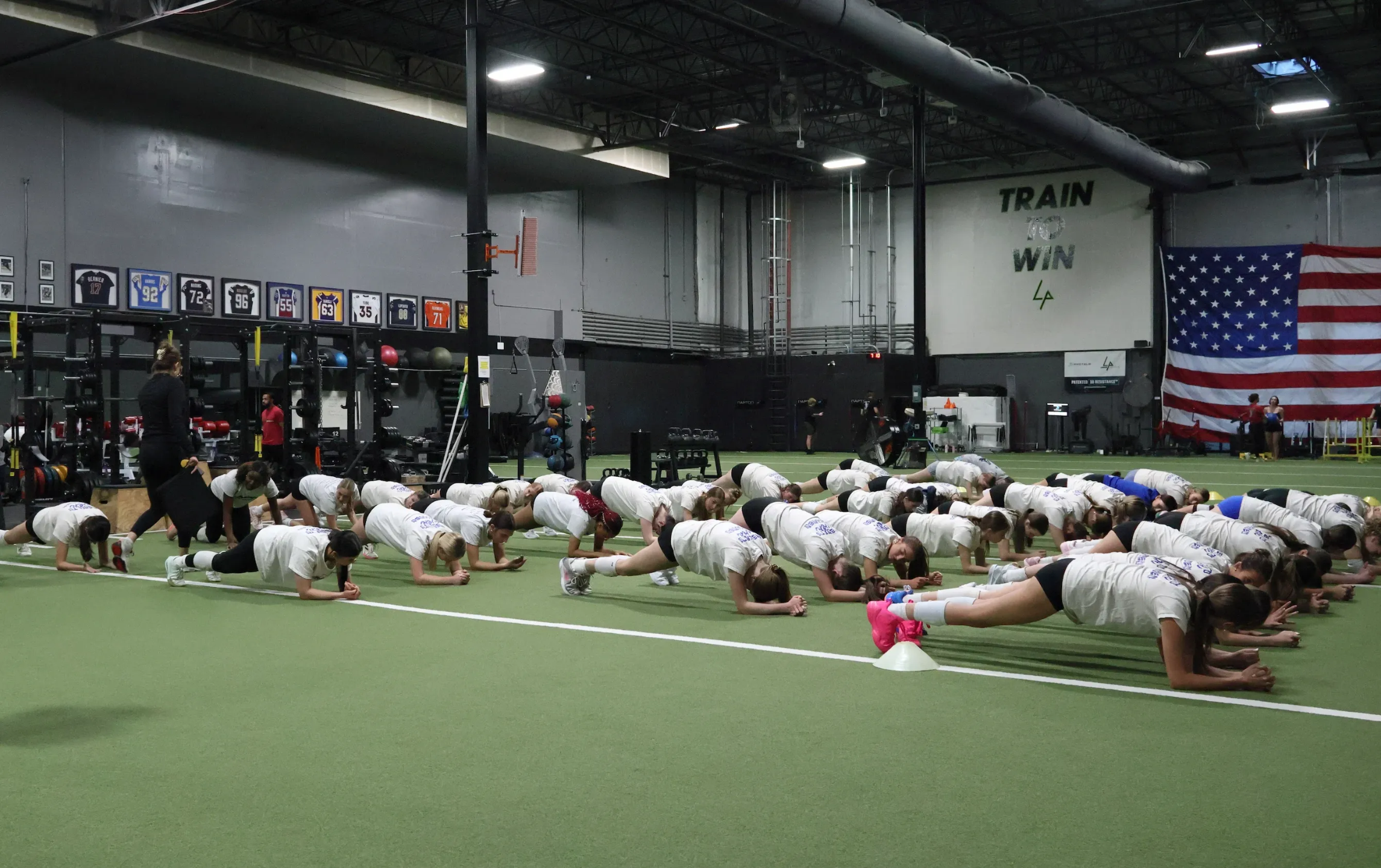 Youth volleyball team training speed and agility at Landow Performance in Centennial, CO