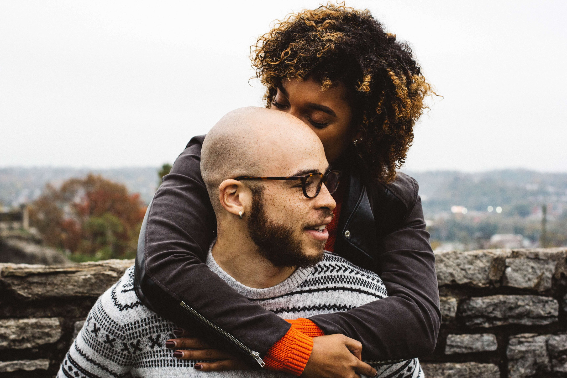 Young heterosexual couple shares a playful "piggyback" moment
