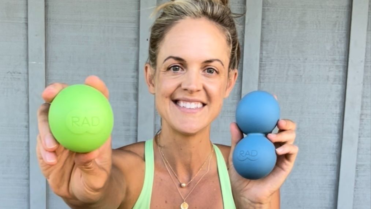 Dr. Angie with myofascial release tools - smooth mobility ball and peanut ball