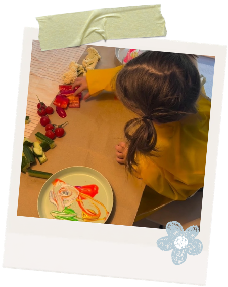Child exploring different foods during a fun food activity