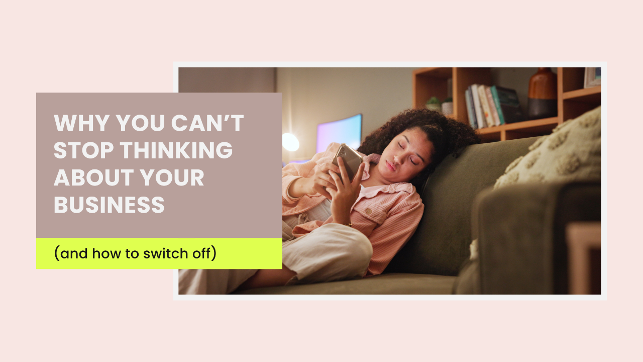 Woman on sofa at night, phone down, visibly distracted — can't switch off from work