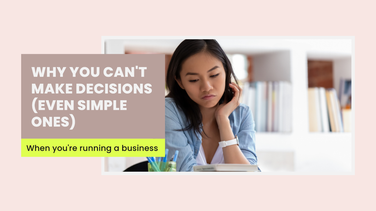 Female founder with pen hovering over paper, unable to decide — decision paralysis as a nervous system freeze response