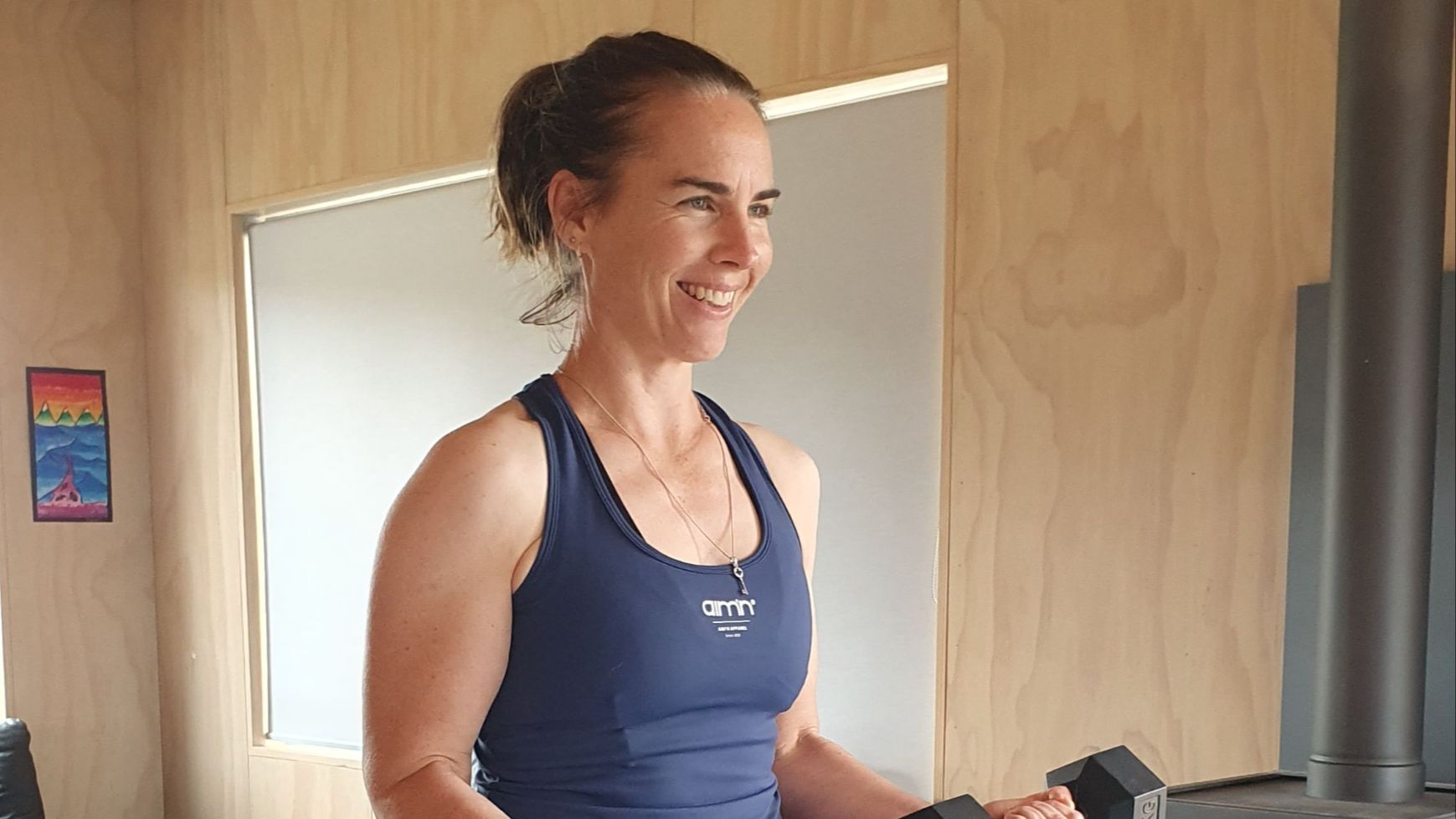 woman strength training at home