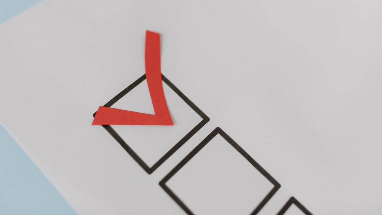 Close-up of three checkboxes with one checked, symbolizing daily, weekly, and monthly marriage checks