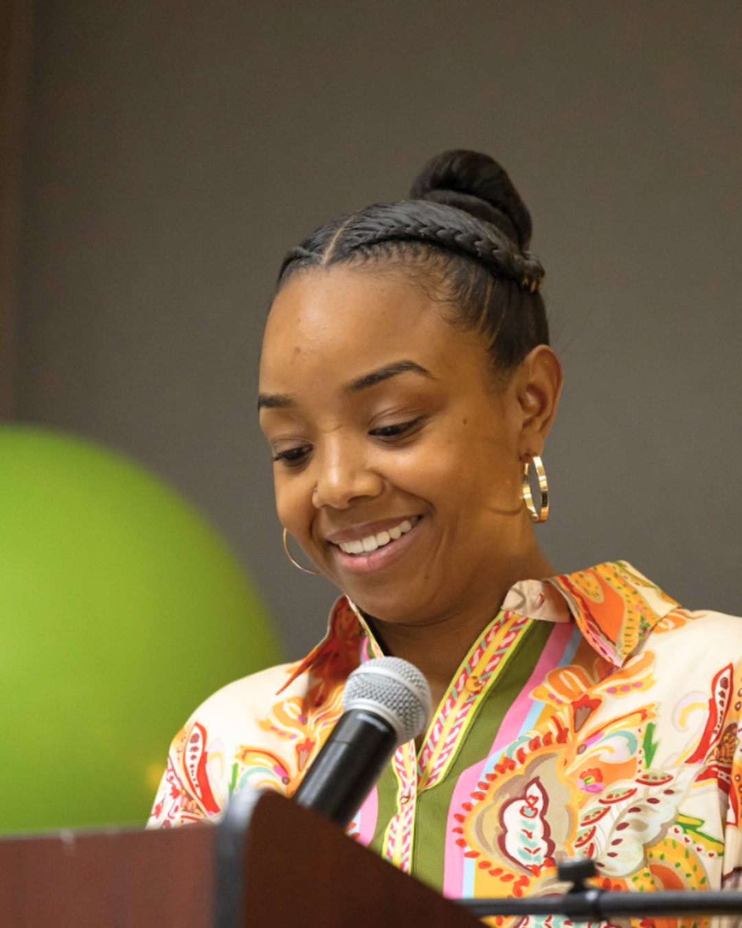 RaQuel Hopkins speaking on stage
