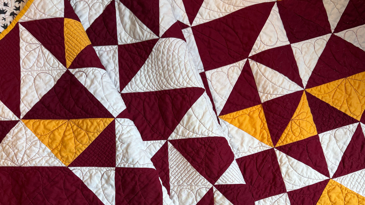close up of finished school spirit quilt