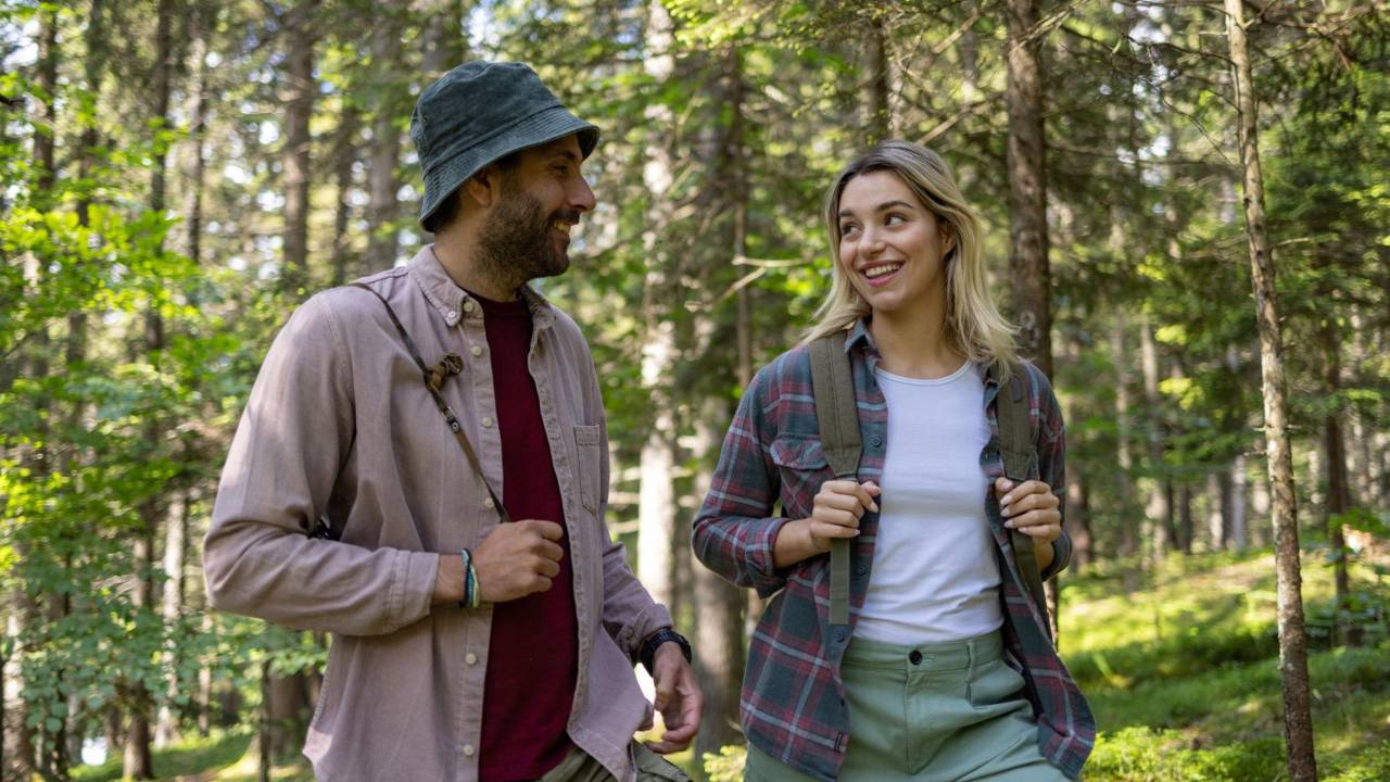 Empowered couple connecting and navigating different parenting styles together