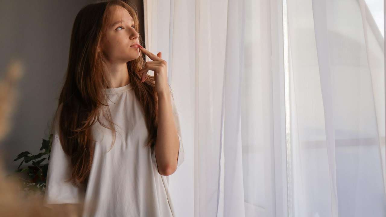Parent having an emotional conversation with their teen about boundaries and connection