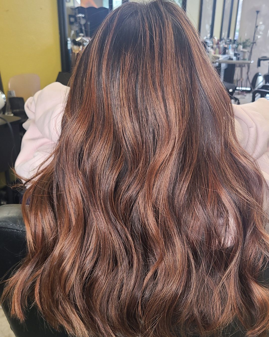 Copper brunette balayage with a seamless root