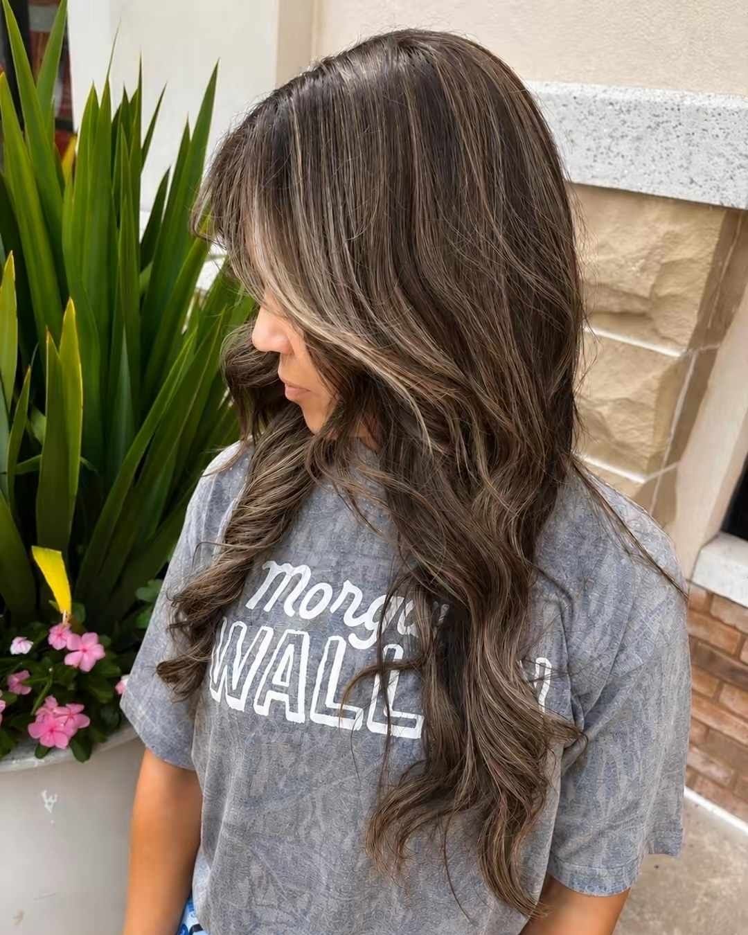 After: dimensional brunette highlights with soft waves