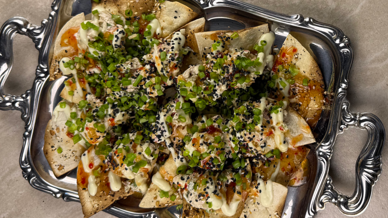 crab rangoon baked nachos on tray