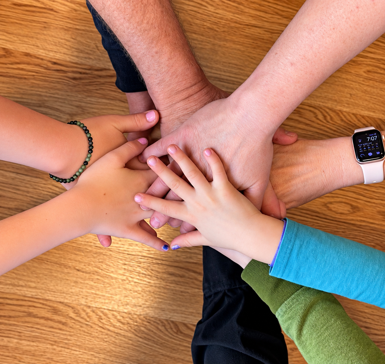 Hands joined together in a circle
