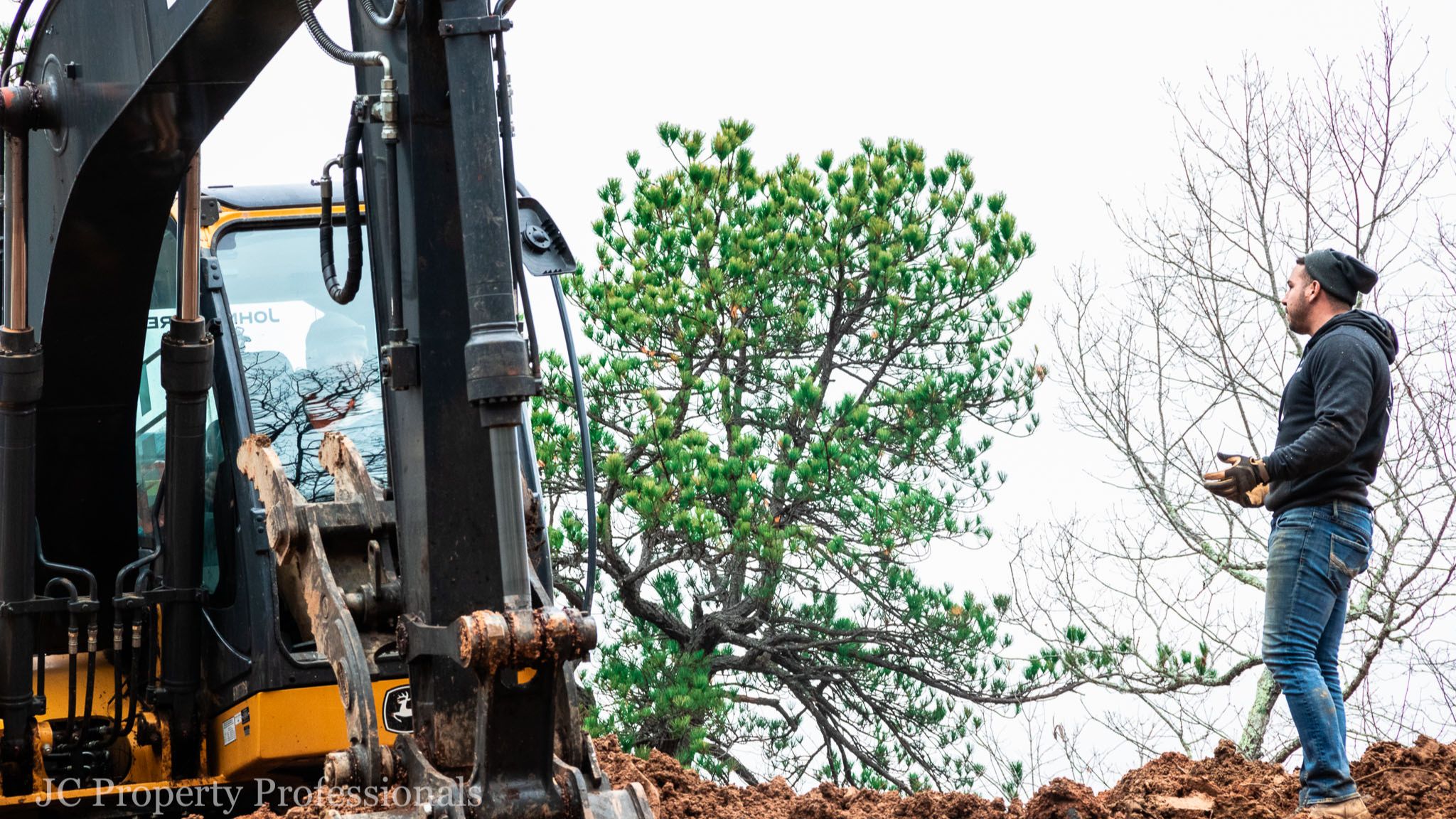 John Seaman Shrugs at a John Deere Excavator Operator on Dirt Job