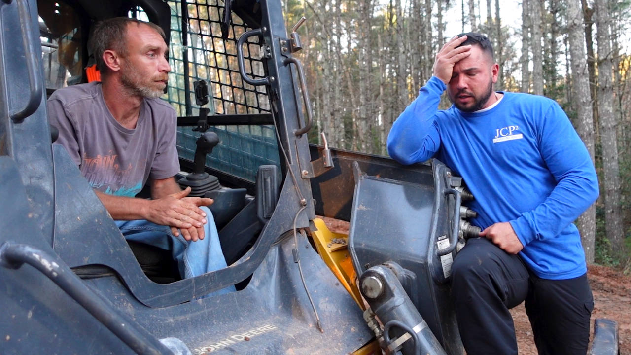 John Seaman Looking Stressed on a Dirt Work Job with a Skid Steer and Operator