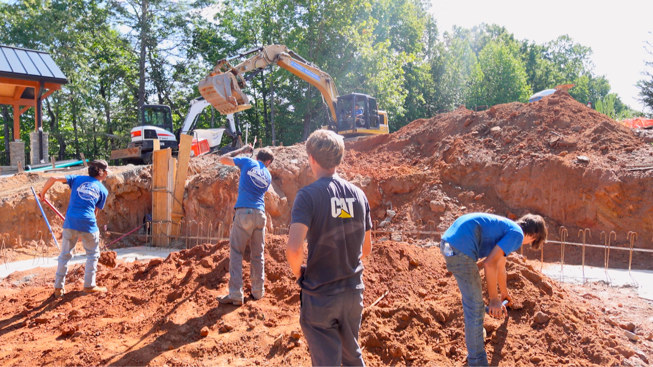 JC Property Professionals crew working on house site prep.