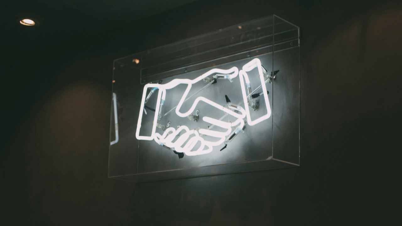 Neon handshake