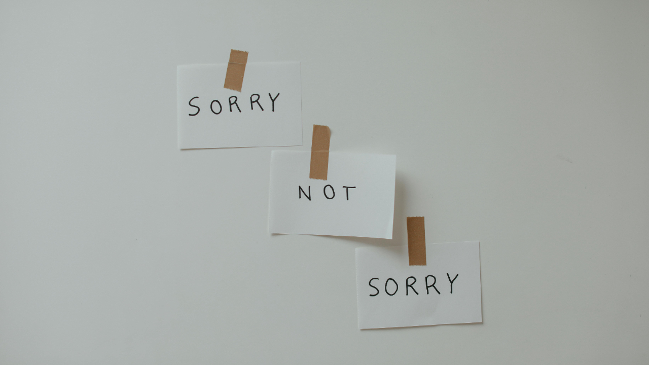 Visualising a non-apology and defensive communication: Notes saying 'sorry not sorry' to illustrate common pitfalls in relational repair and accountability, addressed at Intimata Oxford.